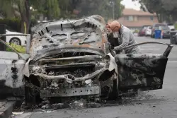 Federal investigators comb site of San Diego plane crash in neighborhood of military housing
